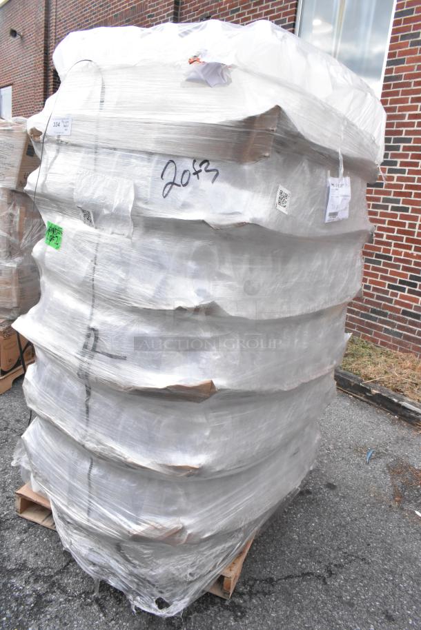 Pallet wrapped with translucent HDPE milk jugs, 1-gallon size, with handle. Brand new, labeled with scratch and dent status.
