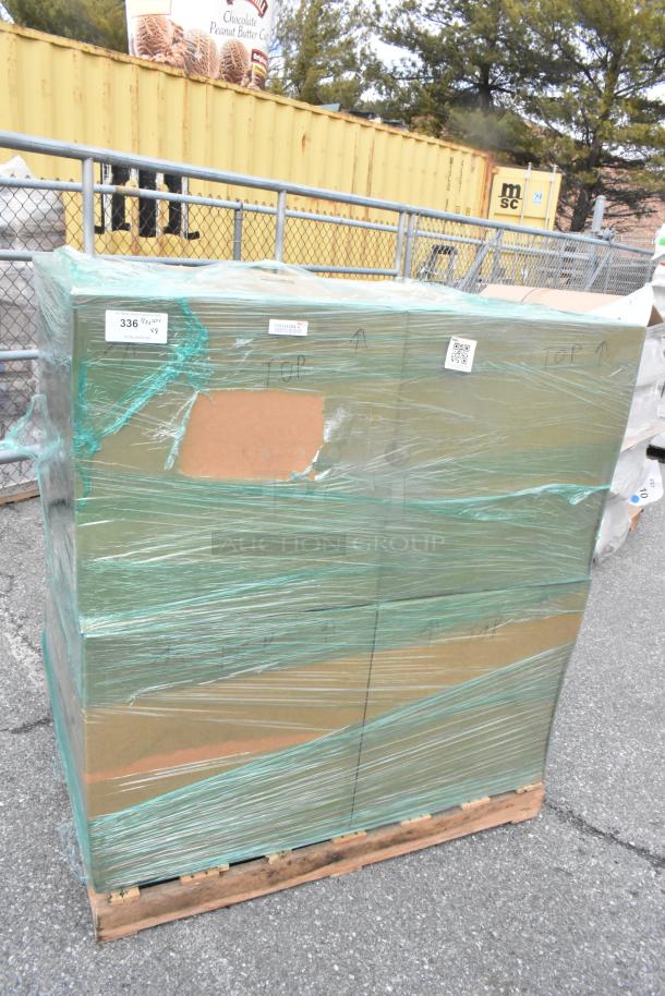 Pallet with boxes labeled "336 1/2 qty" containing 8 new Martha Stewart Taytum saddle brown swivel chairs wrapped in plastic.