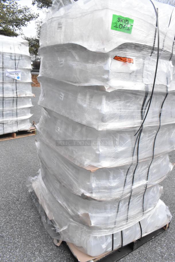 Pallet of 1-gallon HDPE milk jugs with handles, new condition, light scratches, shrink-wrapped, labeled "SKID 204".