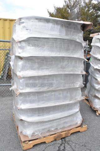 Pallet of brand new 1-gallon translucent HDPE milk jugs with handles, wrapped in plastic. Scratch and dent condition.