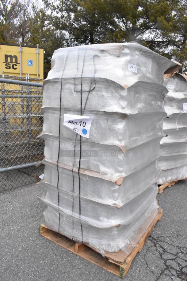 Pallet of new translucent HDPE 1 Gallon (128 oz.) milk jugs with handles, wrapped and tagged "JAN26-10 876". Scratch and dent.