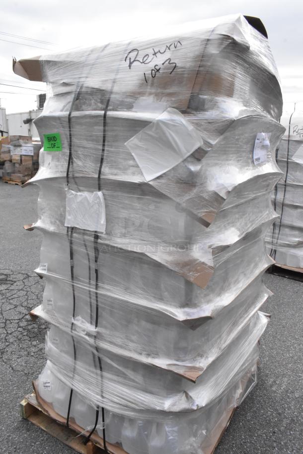 Pallet of new scratch and dent 1-gallon translucent HDPE milk jugs with handles, wrapped in plastic. Marked "Return 1 of 3."