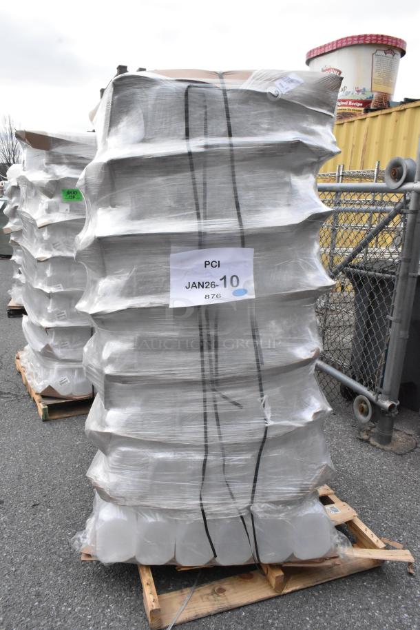 Pallet of 1 Gallon Translucent HDPE Milk Jugs with Handle, brand new, scratch and dent, wrapped in plastic, label reads "PCI JAN26-10 876".
