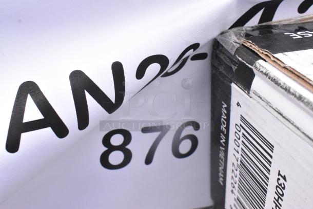 Boxes with items including hot cups, plates, containers, and bags. Visible label reads "Made in Vietnam" with a barcode.