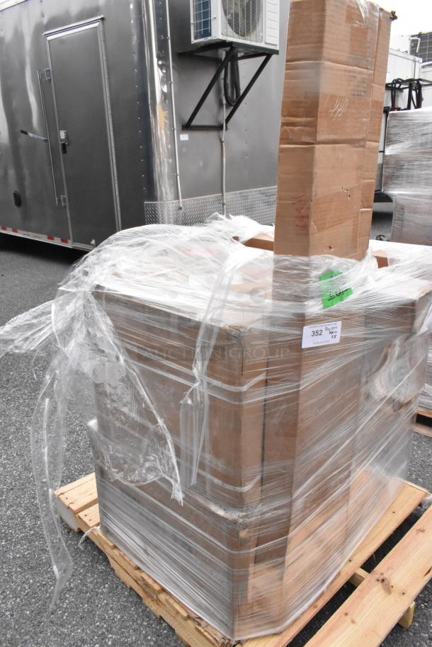 Stacked boxes of scratch and dent items on a pallet, wrapped in plastic. Includes 70 Quart Ultrastorage Boxes, bar sink.