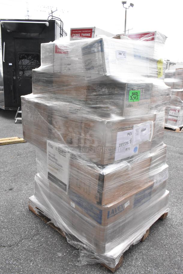 Plastic-wrapped pallet containing 35 scratch and dent items including containers, ice bags, and napkins. Various labels visible.