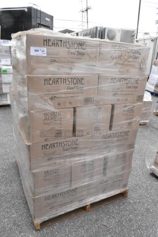 Pallet of 42 new Hearth Stone food trays, scratch and dent condition, wrapped in plastic, visible brand label on boxes.