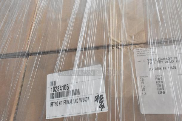 35 new scratch and dent items wrapped in plastic, featuring Vollrath RT100-DR Retro Kit Fabkal and marked with shipping labels.