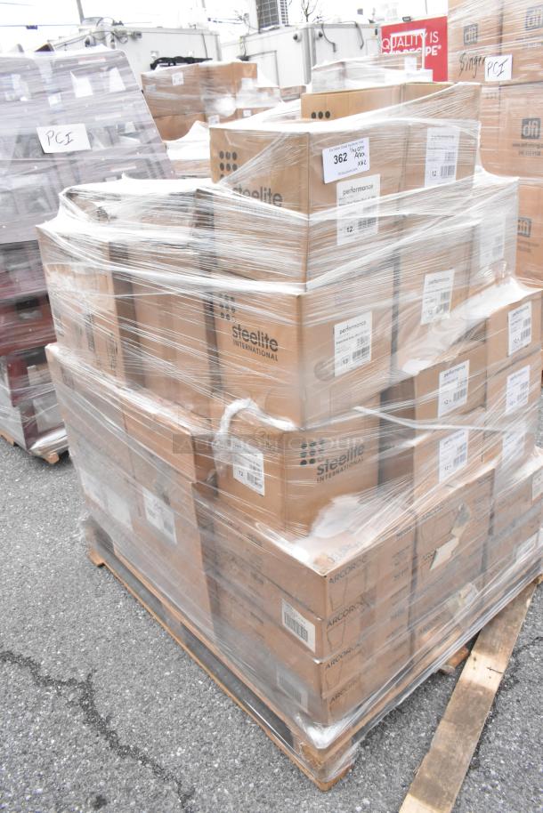 Pallet of 62 brand new scratch and dent items in sealed boxes, including Steelite plates, dessert spoons, and Arcoroc glasses.