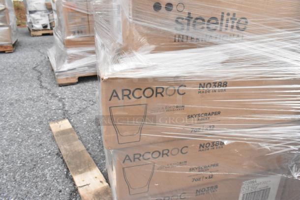 62 new items including Steelite Performance plates, Arcoroc NO388 Skyscraper rocks glasses, wrapped on pallets. Tags show item details.