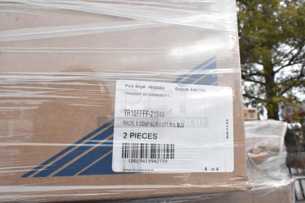 Box labeled TR10FFFF-21844 containing Vollrath racks. New item with packaging visible, barcode shown.