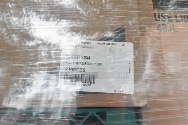 Pallet of new scratch and dent items, including labeled Vollrath TR10FFFF-21844 racks. Packaged in shrink wrap.
