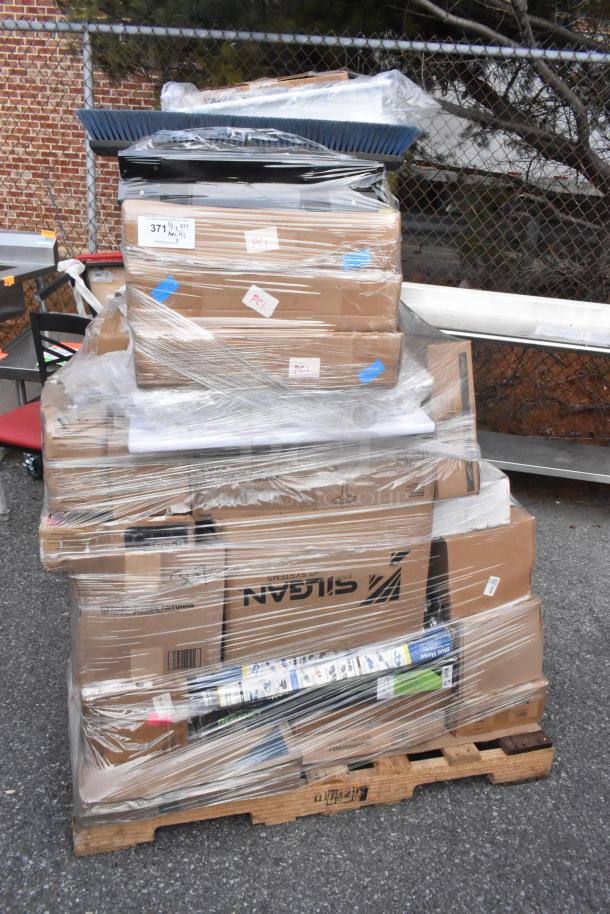 Pallet with 42 new scratch and dent items, wrapped in plastic. Contains cutting board, fan motor, glasses. Various boxes visible.