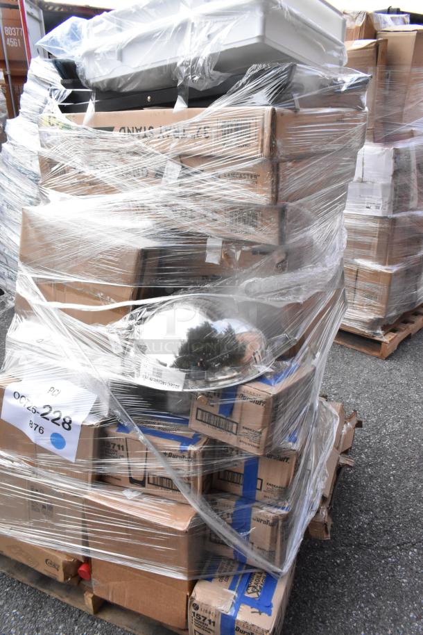 Plastic-wrapped pallet with 42 new scratch and dent items, including cutting board, fan motor, juice glasses, and dessert glasses.