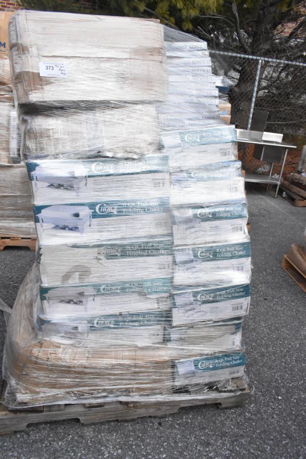 Stacked pallet of 40 scratch and dent items including mirrors and sinks, wrapped in plastic with visible boxes marked "Choice."