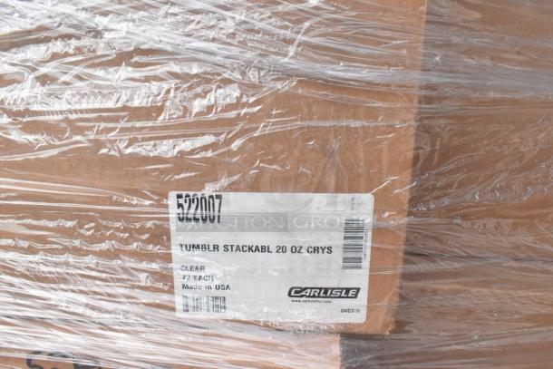 Box of Carlisle 522007 stackable 20 oz. clear SAN plastic tumblers, labeled "72 each, made in USA," wrapped in plastic.