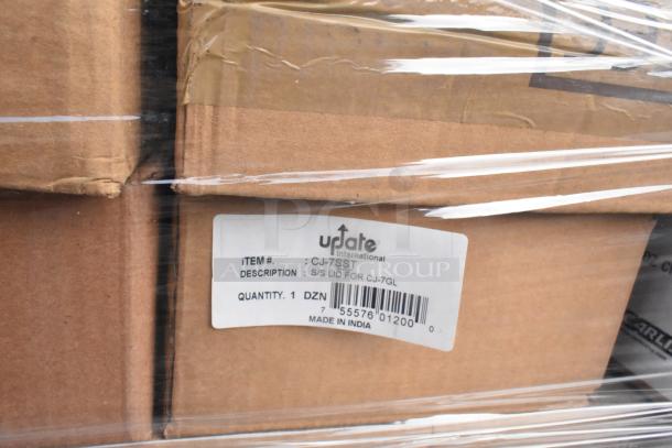 Stack of boxes containing Update International CJ-7SST stainless steel lids; quantity labeled as 1 dozen per box.