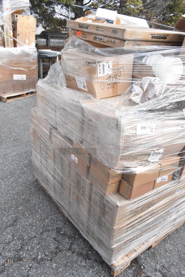 Pallet with 50 new scratch and dent items wrapped in plastic, including Carlisle tumblers, Update ash trays, and sherbet dishes.
