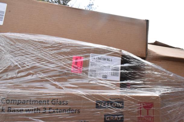 Boxed items wrapped in clear plastic with visible labels indicating "3 Shelf Filled ANSI B." Lot number and expiration date are displayed.