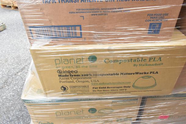 Pallet with boxes labeled "Ingeo" compostable PLA by Stalkmarket, containing lids and cups, brand new scratch and dent items.
