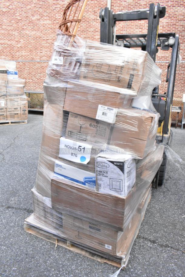 Pallet of 37 new scratch and dent items, including table tops, wicker baskets, plastic plates, bowls; wrapped in plastic.