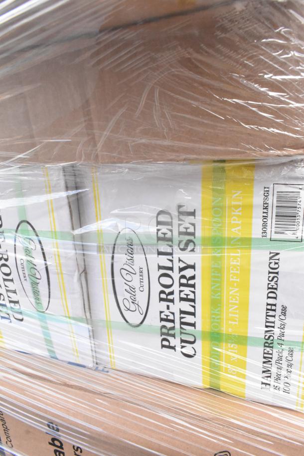 Plastic-wrapped boxes of Gold Visions pre-rolled cutlery sets, featuring forks, knives, spoons, and linen-feel napkins.