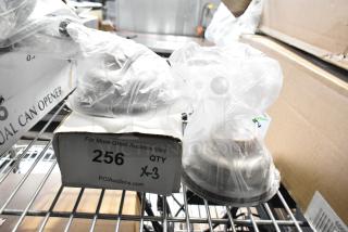 Three brand new Regency 600DB35 basket drains with strainers in packaging, slight cosmetic imperfections. Quantity 3.