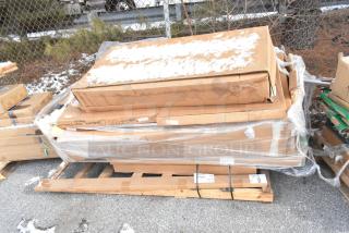 Pallet with 12 new scratch and dent items, including Quantum P63P post, Metro shelves, Gold Bond caster; packaged in boxes.