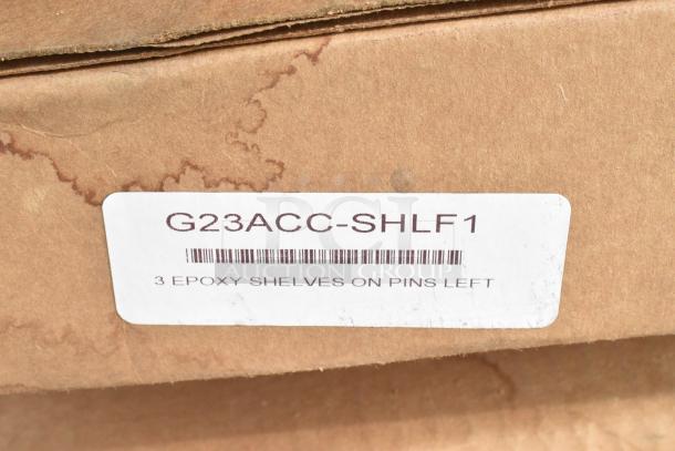 Box with label marked "G23ACC-SHLF1, 3 Epoxy Shelves on Pins Left." Brown cardboard packaging, unopened.