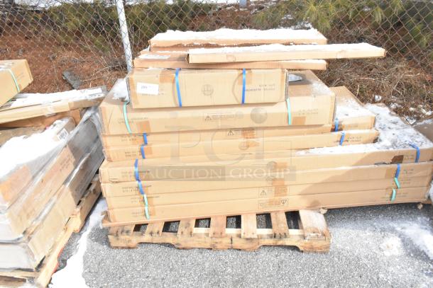 Boxes of 14 brand new scratch and dent items on pallet, including Metro posts and various Serv-Ware wire shelves.