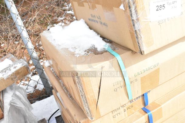 Boxes of brand new scratch and dent wire shelves and posts, 14 items total. Labels show Serv-Ware GR1848CWP, SL1860CWP.