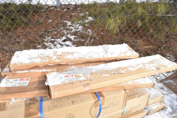 New boxed items, including Metro 74TSPK3-4PK posts, Serv-Ware shelves, some snow on boxes, scratch and dent condition.