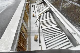 14.5' stainless steel return air grease hood with filters and lights, showing good condition, ideal for commercial kitchens.