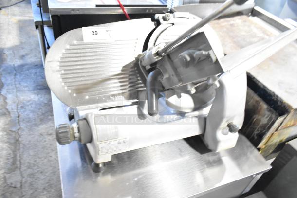 Hobart 2612 stainless steel meat slicer with blade sharpener, 115V, 1 phase. Tested, working, commercial countertop model.