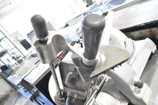 Hobart 2612 stainless steel meat slicer with blade sharpener, countertop model. Tested, working, 115V, 1-phase.