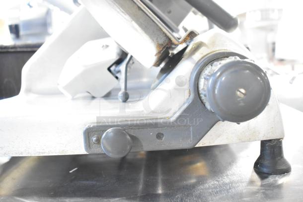 Hobart 2612 stainless steel commercial meat slicer with blade sharpener, 115V, 1 phase, tested and working.