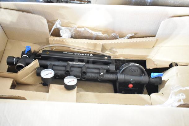 Everpure EV932773 Insurice Triple PF-7FC-S water filter assembly in box, includes pressure gauges, new condition.