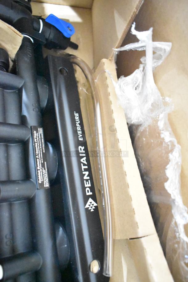 Pentair Everpure EV932773 Insurice Triple PF-7FC-S water filter cartridge assembly in box, includes hoses and fittings.