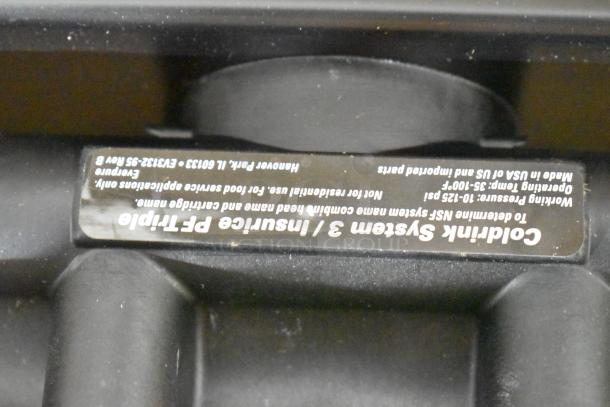 Everpure EV932773 Insurice Triple PF-7FC-S Water Filter Cartridge Assembly with label detailing operational specs.