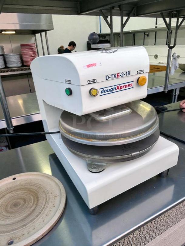 Premium DoughXpress D-TXE-2-18W LV electric dough press, 18-inch, in excellent condition, made in USA.