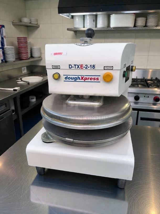 Premium DoughXpress D-TXE-2-18W LV electric dough press, 18", excellent condition, tested and working, made in USA.