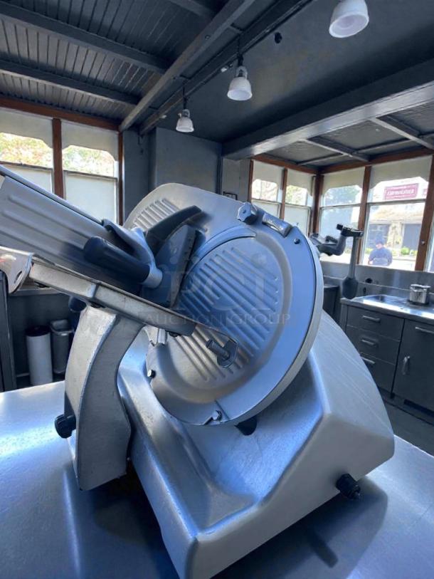 High-grade Hobart commercial meat slicer in excellent condition, UL & NSF certified, heavy-duty manual model HOB-L-SLI-0289.