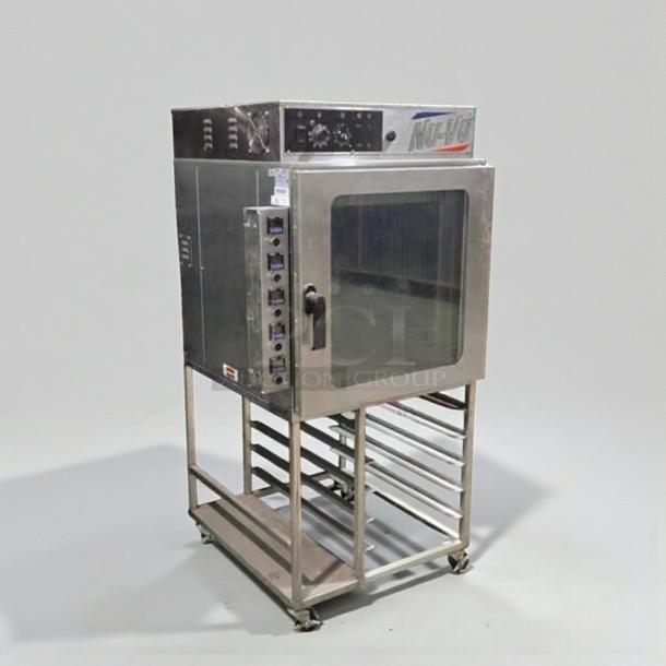 Nu-Vu RM-5T commercial electric oven, 208V/3 Phase, ETL listed. Stainless steel, exceptional condition, fully tested.