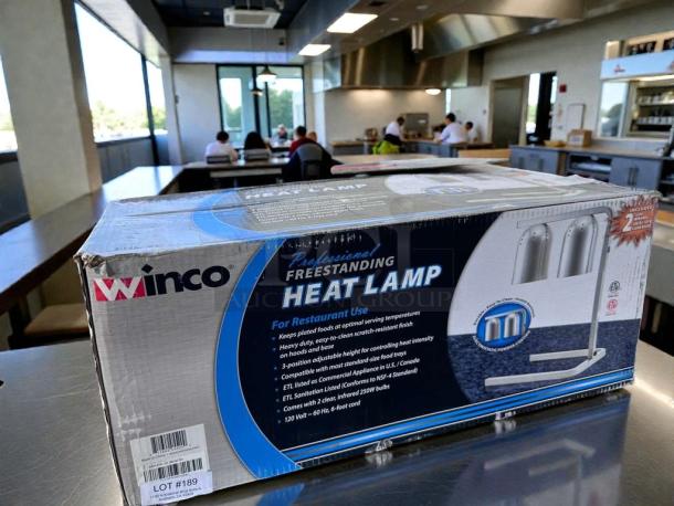 Brand new Winco EHL-2 professional dual heat lamp in original box. UL & NSF listed, ideal for commercial food warming.