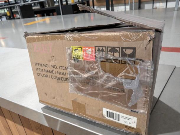 Brand new Zuomor Jump Table Lamp Set in original box. Features 3 rustic amber glass lights, model ZUO-S-LMP-0297.