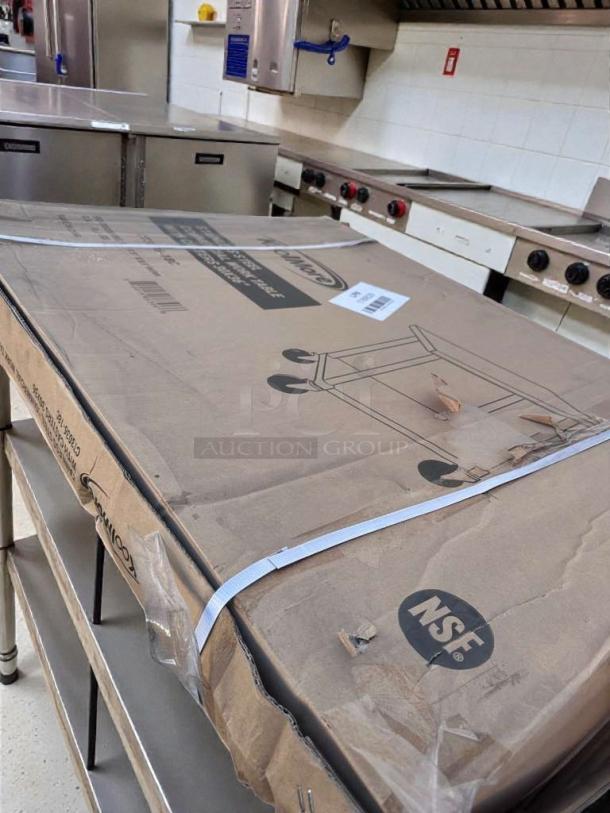 Brand new KoolMore CT3036-18C stainless steel work table in original box, NSF Listed, dimensions 30" x 36", with casters.