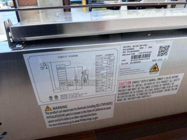 Brand new KoolMore SCDC-8P-SSL refrigerated prep rail, stainless steel, UL listed. Circuit diagram and warning labels visible.