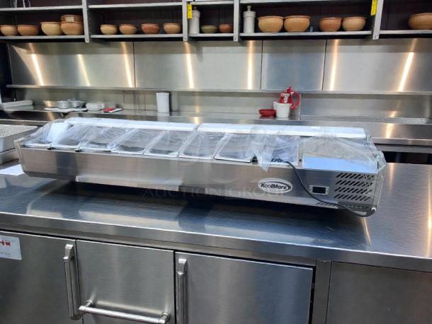 Brand new KoolMore SCDC-8P-SG refrigerated prep rail, 8-pan capacity, glass sneeze guard, UL listed, original packaging.