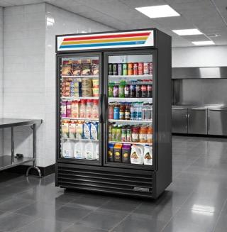 True GDM-49 glass door merchandiser refrigerator, 49 Cu. Ft., premium condition, UL listed, fully stocked, stainless steel interior.
