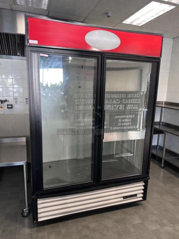 True GDM-49 merchandiser refrigerator, 49 Cu. Ft., dual glass doors, premium condition, UL listed, fully tested, black trim.